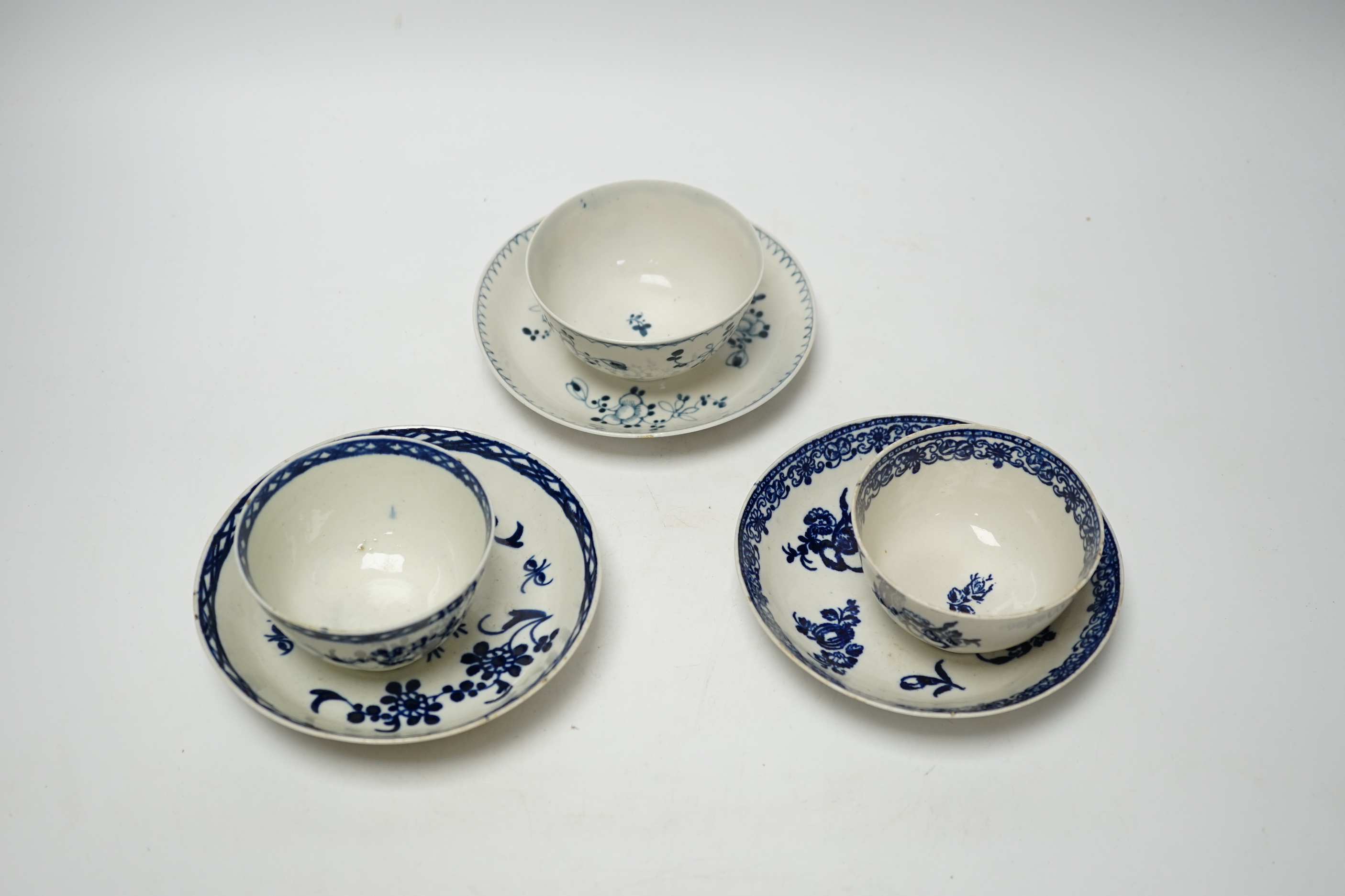 Three late 18th century Liverpool blue and white teabowls and saucers